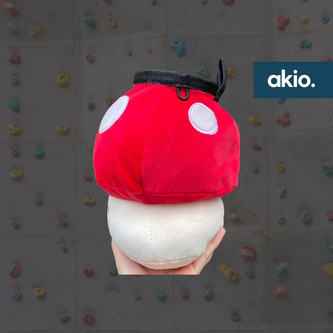 Red Mushroom Chalk Bag, side view showing elastic loop for chalk brush