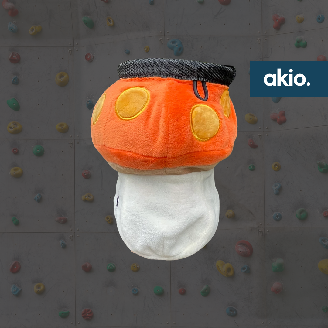 Maplestory Orange Mushroom Chalk Bag, side view showing elastic loop for chalk brush